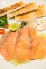  Smoke Salmon slice with Salad on white plate