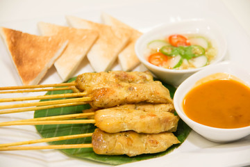 Grilled pork satay with peanut sauce