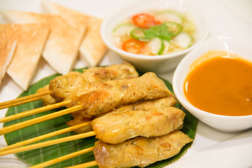 Grilled pork satay with peanut sauce