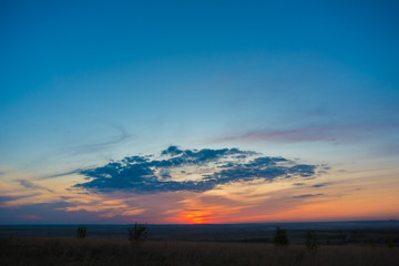 very beautiful summer sunset with bright colors of the sky