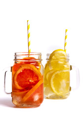 Lemon and grapefruit smoothies in a glass isolated