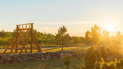 estonian swing set in sunset