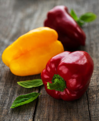 Bell peppers on a wooden background