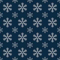 Blue seamless snowflake pattern. Christmas vector background. White snowflakes on a blue background