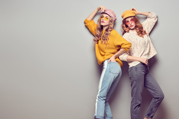 Two Gorgeous Girl Friends in Fashion Autumn Outfit