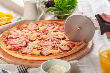 Delicious fresh pizza served on wooden table