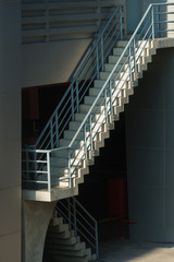 Stairway with metallic banister in a new modern building architecture