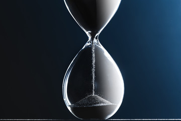 Hourglass on dark background