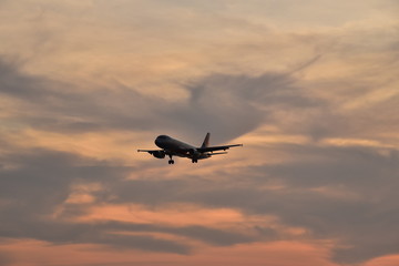 Phuket/Thailand - October 27 2018:The jet star plane is landing in the sunset 