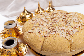 Tasty halva with tea on the table