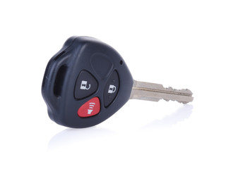 car keys with remotes on white background