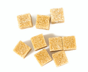 brown sugar cubes isolated on white