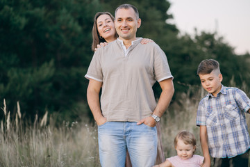 Fototapeta premium family in a field