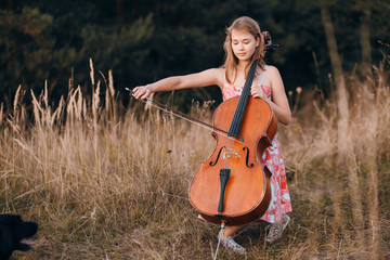 family in a field © hetmanstock2