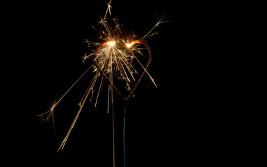 heart sparklers for celebration christmas and happy new year party background,