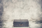 Vintage old classic travel trunk luggage with leather handles circa early 1900s. Travel concept. Retro style filtered photo