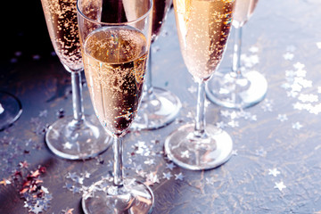 Glasses of champagne on the table - obrazy, fototapety, plakaty