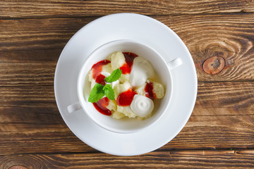 Healthe breakfast - lazy dumplings with sour cream and strawberry jam