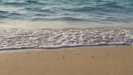 Fototapeta na wymiar さざ波と砂浜