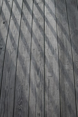 Old wood texture background with light beams