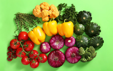 Flat lay composition with various vegetables on color background