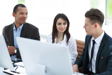 Fototapeta premium employees discussing new ideas in the workplace in the office.