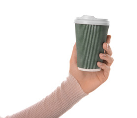 Woman holding paper coffee cup on white background