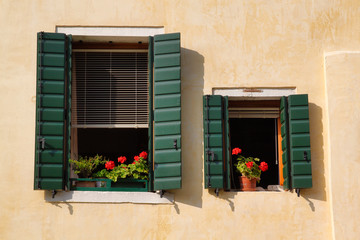 Fototapeta na wymiar View of house windows with shutter in the old town Venice Italy