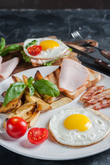 Fried egg and bacon on plate