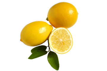 bright yellow lemons half lemon and lemon leaves on white isolate background
