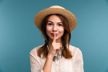 Portrait of a young pretty girl in summer hat