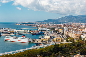 Panoramic and aerial view of Malaga in a beautiful spring day, Spain