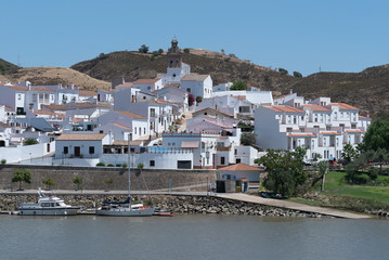 Fototapeta na wymiar Sanlúcar de Guadiana, in Spain, is on the other side of the Rio Guadiana in front of Alcoutim in Portugal.