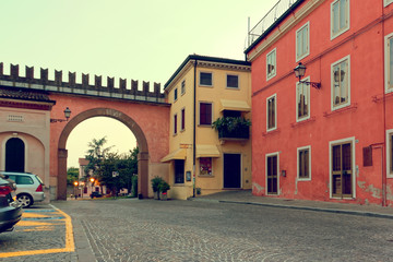 Verona, Italy-August 5, 2018: Village of Colonia Veneto. Beautiful street with retro houses in the evening.