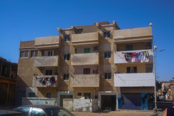 Outdated ruins of houses, slums in poor areas of Egypt. Hurghada and Cairo Asia. Stock photo for design