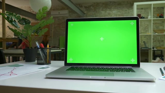 Green screen, modern laptop, office illustration, desktop indoor, cosy place.