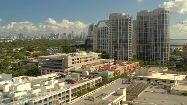 Aerial drone footage of Coconut Grove Miami neighborhood and highrise condos