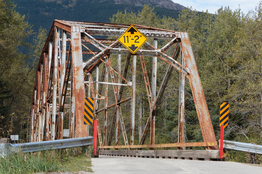 Old Bridge Over The Dyea River Near The Klondike Gold Rush  Historical  Park Near Skagway Alaska