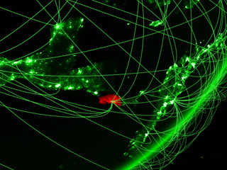 Costa Rica on green model of planet Earth with network at night. Concept of green technology, communication and travel.