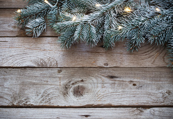 Christmas fir on dark wooden background