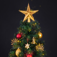 Decorations in the Scandinavian style on an artificial Christmas tree