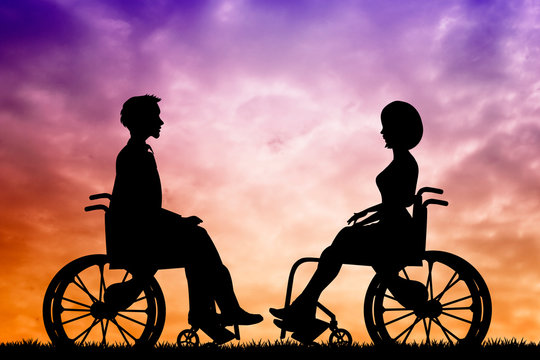 disabled man and woman on a wheelchair