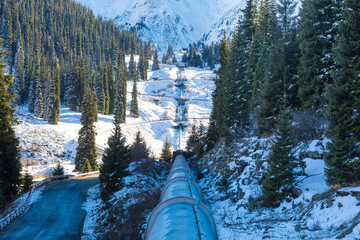 oil pipeline in winter in the mountains