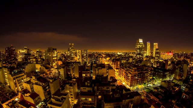 Night time-lapse view on the illuminated skyline of the city in Buenos Aires, Argentina.
