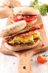 sandwich with fried bacon and egg
