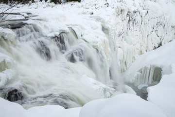 frozen waterfall Tannforsen in winter, Sweden