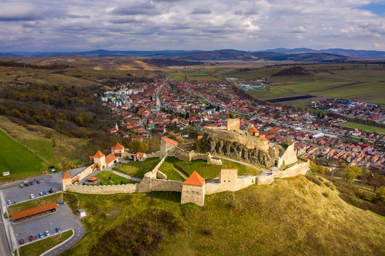 Rupea castle in Transylvania at sunset. Aerial view.
