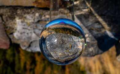Naklejka na ściany i meble The lookout ledge from Lone Pine State Park creates a beautiful image through the lensball.