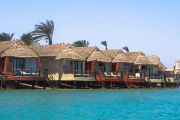 Beautiful view of the coastline with houses and hotels on the red sea. Tourist region in Egypt. Hurghada and its traditions. Stock photo for design