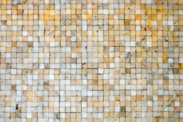 Golden shiny ceramic tile texture background